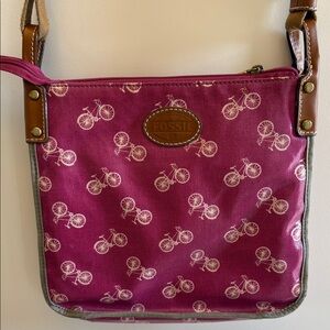 Fossil canvas crossbody all-over bicycle print, leather patch, leather trim.